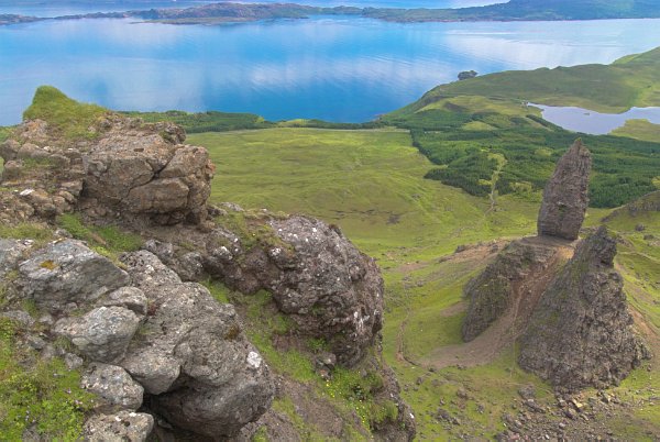 Looking down past the Old Man of Storr to beautiful Loch Leathan. Photo of the Old Man of Storr on the Isle of Skye, Scotland. Part of the Britain Express Travel and Heritage Picture Library, Scotland collection.
